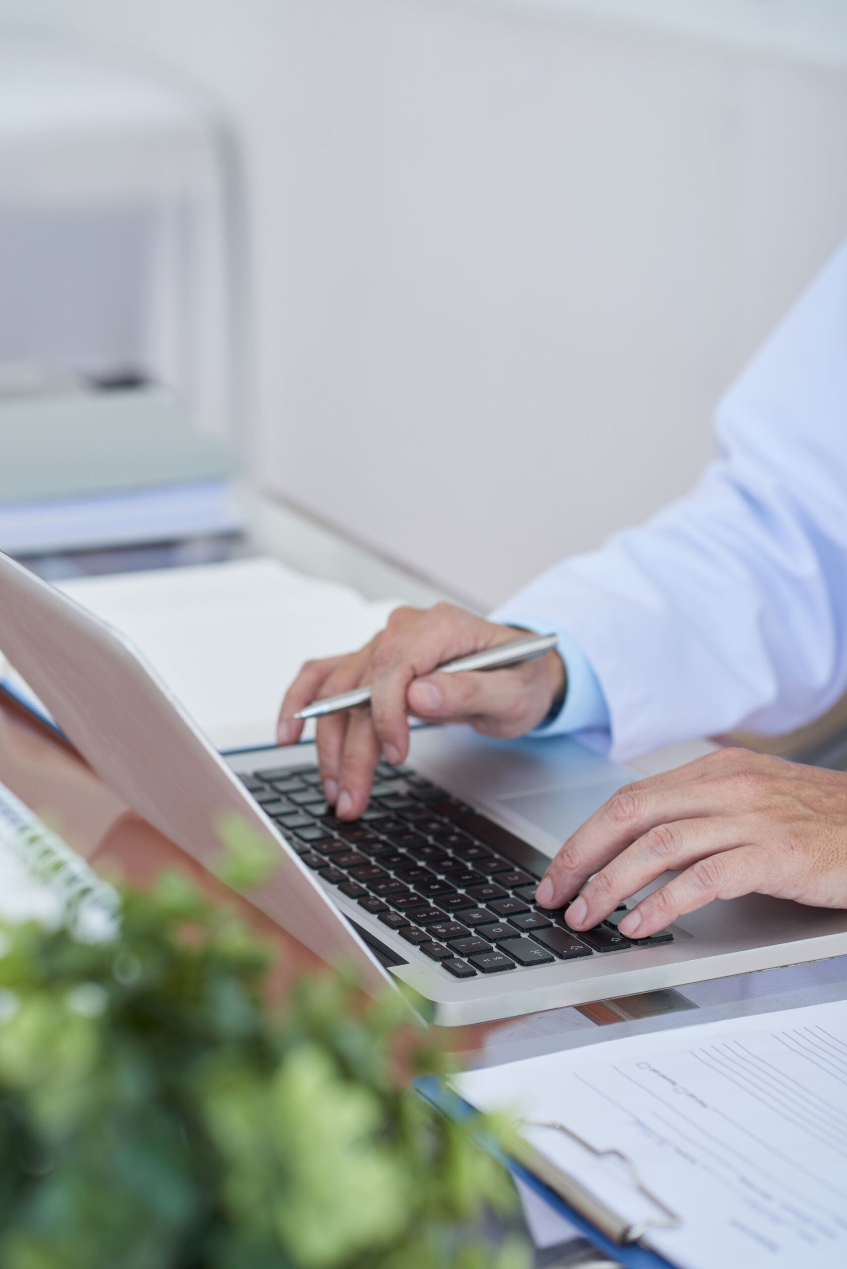 Doctor working on laptop